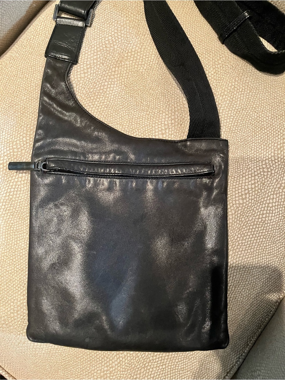 Soft Black leather crossbody bag with webbed strap